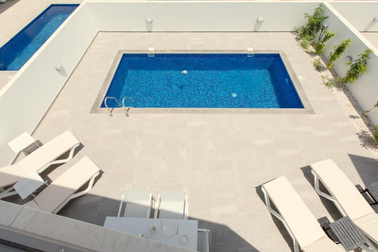 Palm Tree Villas Livadhia Экстерьер фото
