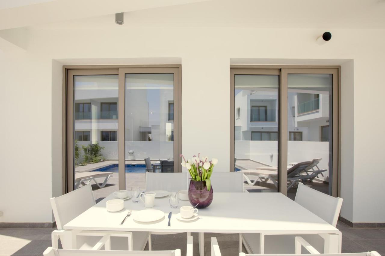 Palm Tree Villas Livadhia Экстерьер фото