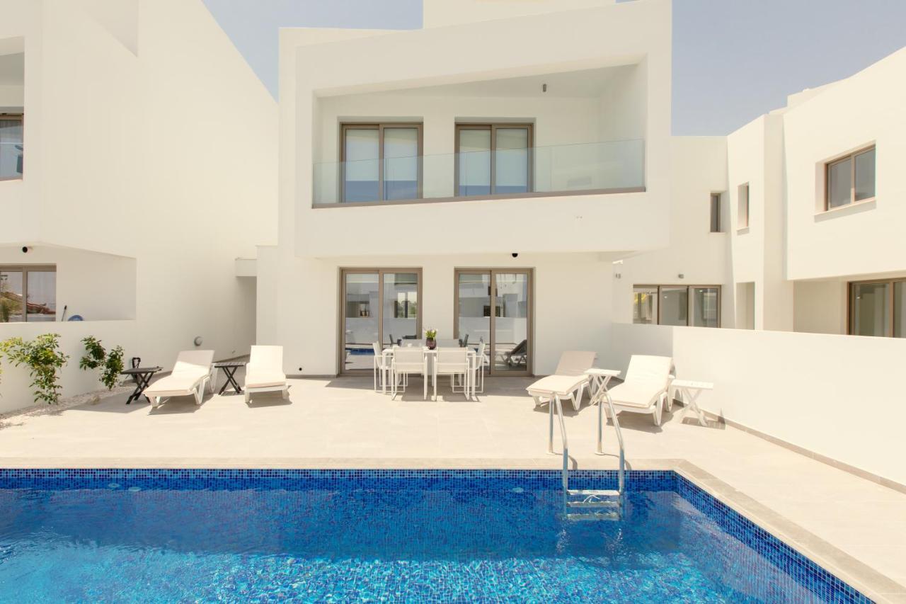 Palm Tree Villas Livadhia Экстерьер фото
