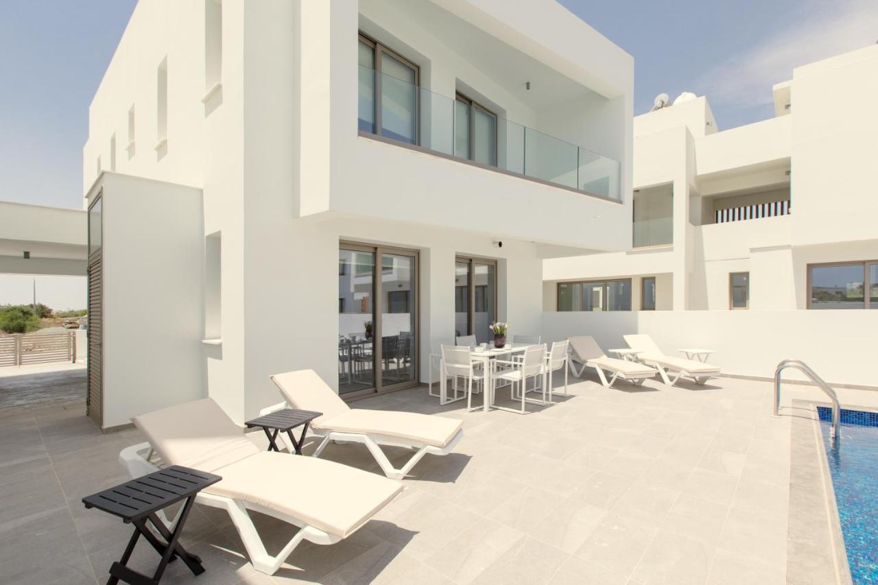 Palm Tree Villas Livadhia Экстерьер фото